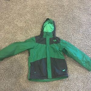 The NorthFace explorer grey and green rainjacket